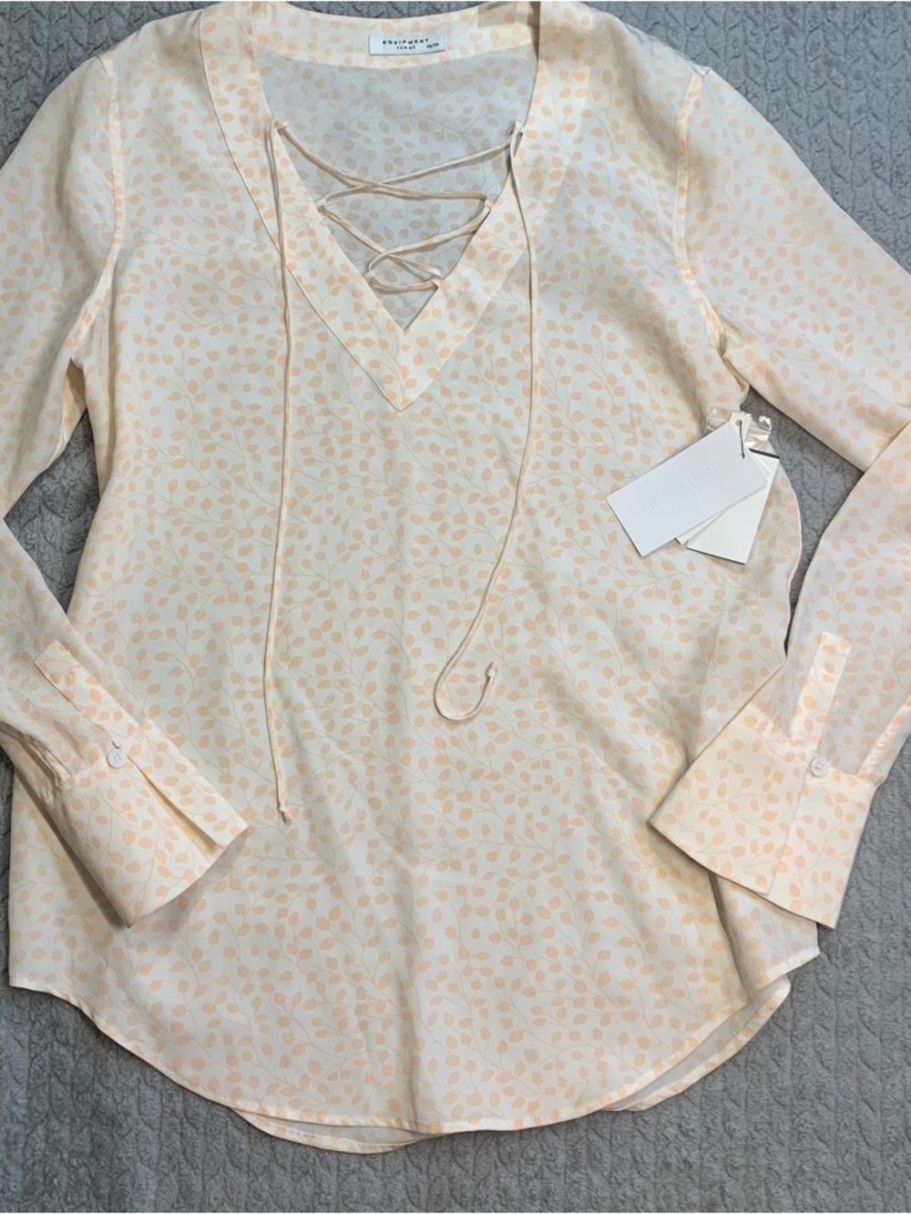 Equipment Cream Lace-Up V-Neck Blouse with Subtle Peach Leaf Print